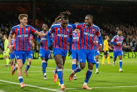 Christantus Uche is congratulated by Jaydee Canvot and Justin Devenny after giving Crystal Palace the lead against KuPS