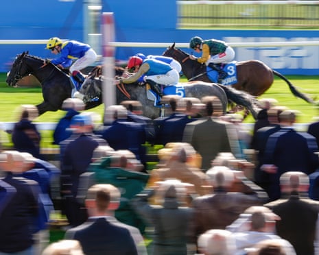 Never So Brave (left, yellow cap), ridden by Oisin Murphy, wins the Challenge Stakes at Newmarket on 9 October 2026.
