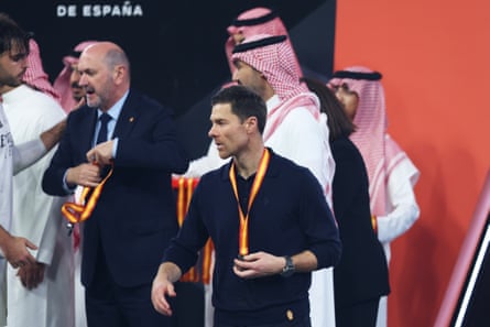 Xabi Alonso wears his runners-up medal after Real Madrid lost the Super Cup final to Barcelona in Jeddah, Saudi Arabia, on 11 January