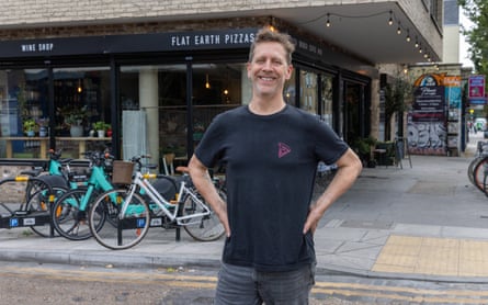 Baker outside his east London restaurant