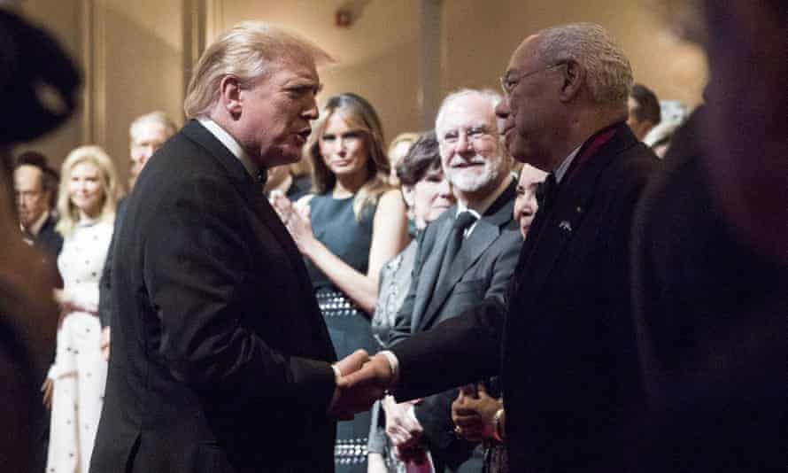 Donald Trump and Powell shake hands at an event in 2019. ‘He thought Trump was insane,’ said someone who worked closely with Powell.
