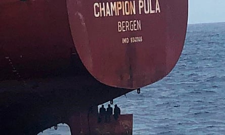 Stowaways sitting on the rudder of the Champion Pula near the Canary Islands, October 2020