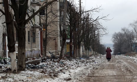 An elderly local resident walks along a street in Siversk, Donetsk region.