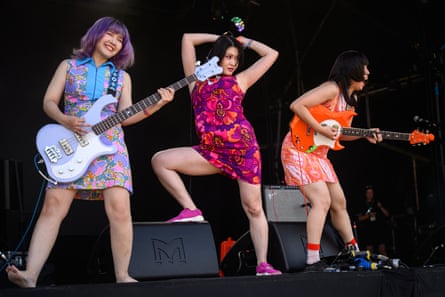from left, bassist Hirochan, singer Accorinrin and guitarist Yoyoyoshie on the Park stage at Glastonbury festival in 2024.