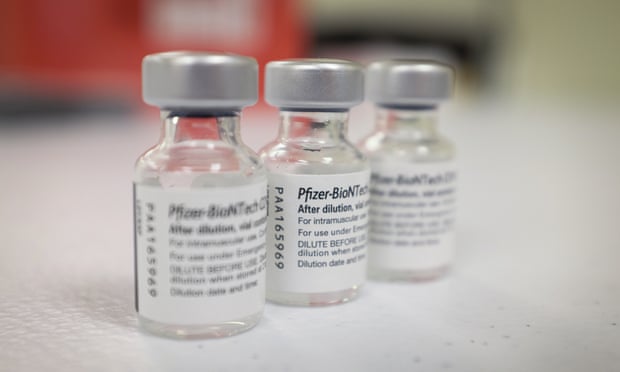 Pfizer-BioNTech Covid-19 Vaccine bottles displayed during a vaccination event, in Florida.