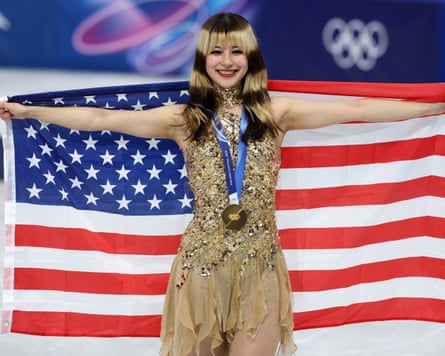 Gold medalist Alysa Liu poses with her medal at the Milano Cortina 2026 Winter Olympic Games.
