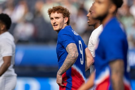 Josh Sargent looks backward while in action for the USMNT