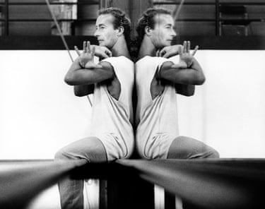 A black and white photograph of dancer Graeme Murphy in rehearsals