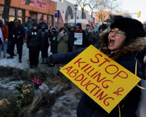 Person holds up sign