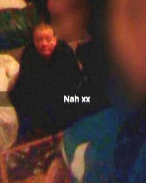 An image sent by one of the girls on Snapchat showing an injured Wrightson in the background.