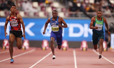 Christian Coleman (centre) was the fastest qualifier in the men’s 100m heats despite slowing to a trot by the end of his race.
