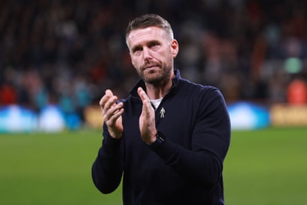 16 December 2023 Rob Edwards, manager of Luton, applauds the fans after the match with Bournemouth is suspended following Tom Lockyer’s collapse at Vitality Stadium.