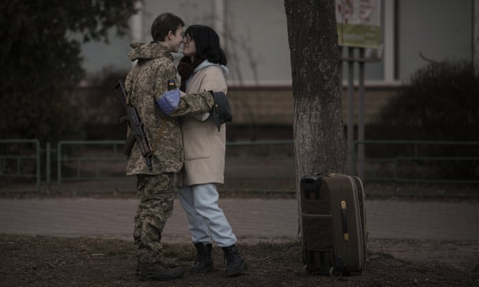 Bogdana, 17, rubs noses with her boyfriend, Ivan, 19, in Brovary, Ukraine, Sunday, March 20, 2022.