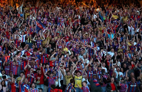 Crystal Palace fans watching at Selhurst Park celebrate after Jean-Philippe Mateta scores their side’s first goal during the Europa Conference League final.