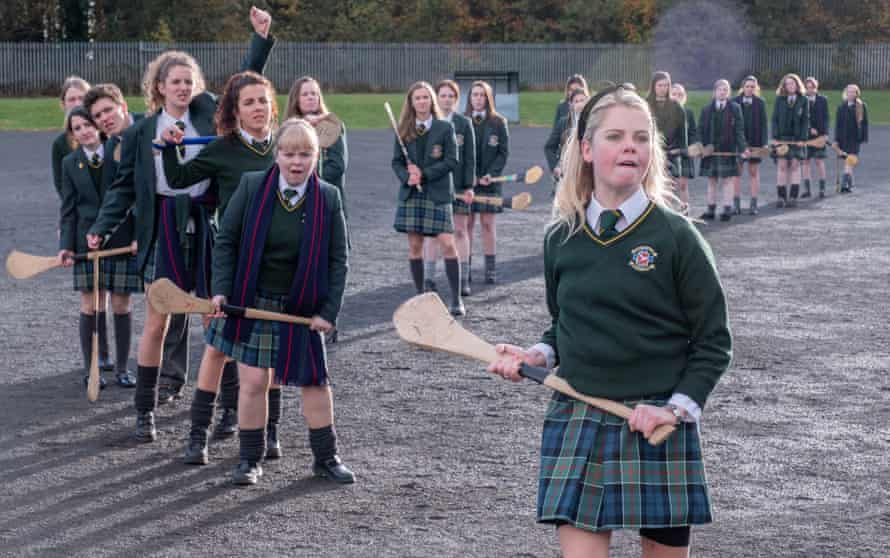 Front to back:-Erin Quinn (Saoirse Monica Jackson), Clare Devlin (Nicola Coughlan), Michelle Mallon (Jamie-Lee O’Donnell), Orla McCool (Louisa Clare Harland), James Maguire (Dylan Llewellyn) in a still from the TV series Derry Girls