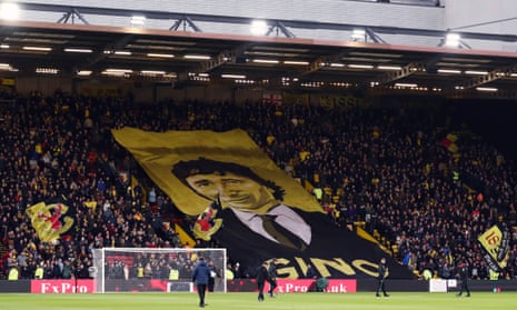 Watford fans display a banner showing the owner, Gino Pozzo. He is intimately involved in all key decisions. 