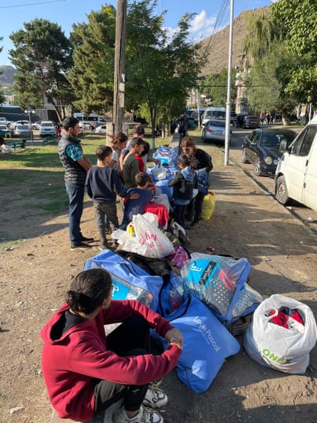 Muriel Talin Clark tends to young children who have fled to Armenia with their families this week, to escape Azerbaijani rule and start a new life.