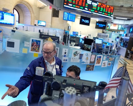 Traders on the New York stock exchange floor, 18 March 2026