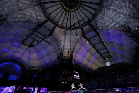 Choi Sebin and Olha Kharlan (right) compete in the bronze medal bout in the spectacular Grand Palais
