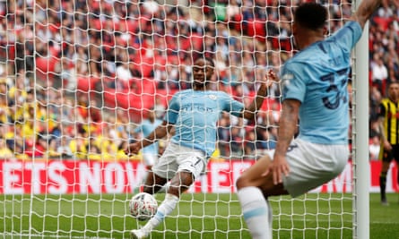 Raheem Sterling puts the ball into the Watford net – although Gabriel Jesus’s shot appeared to have already crossed the line – for Manchester City’s second goal.