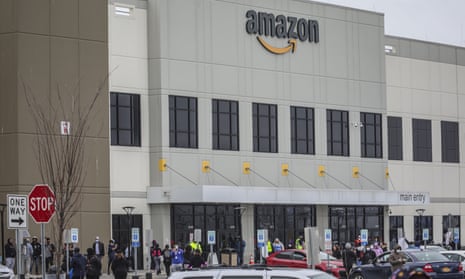 Workers at Amazon’s fulfillment center in Staten Island protest work conditions in the company’s warehouse in New York on 30 March 2020.
