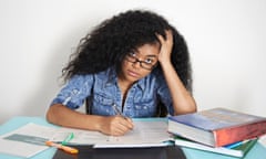 Frustrated Mixed Race teenage girl doing homework