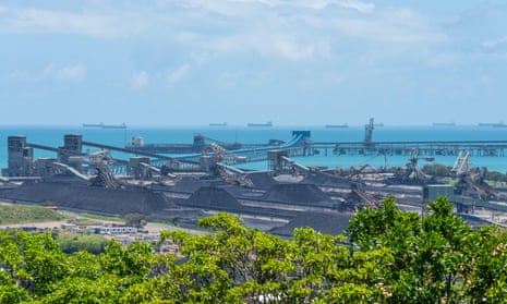 piles of coal ready to be transferred to nearby ships