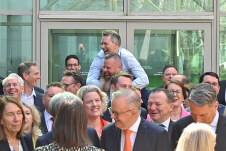 Jason Clare jumps on the back of Dan Repacholi during a photo session with the Labor caucus at Parliament House in September last year.