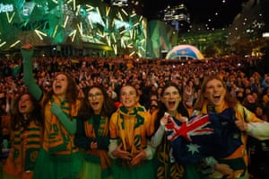 Australia fans react as they watch the match at a fan zone in Melbourne.