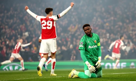 Lens goalkeeper Brice Samba looks dejected after Gabriel Martinelli scored Arsenal’s fourth goal.