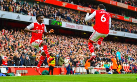 Bukayo Saka celebrates with Gabriel after sending Arsenal into a 2-0 lead over Crystal Palace