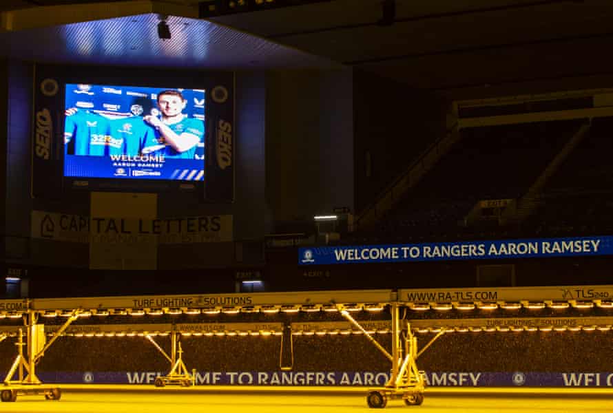 The Ibrox field management system relaxes to watch TV.