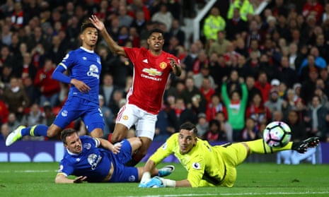 Joel Robles, right, saves a shot by Manchester United’s Marcus Rashford during the draw at Old Trafford. 
