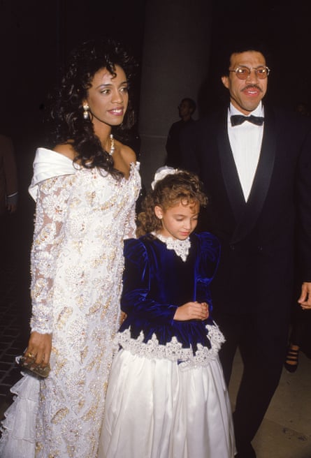 With his first wife, Brenda Harvey-Richie, and their daughter, Nicole, in the late 1980s.