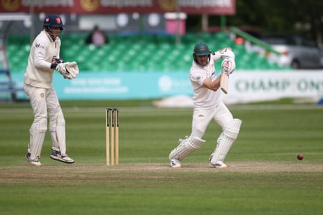 Leicestershire's Ben Cox cover-drives for four against Essex