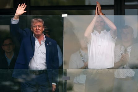 Donald Trump and his son Eric cheer on Bryson DeChambeau of Crushers GC during day three at LIV Golf Virginia