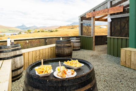 scallops and chips on a barrel outside a seafood shack, Scotland
