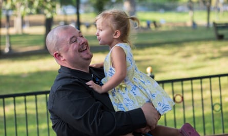 Chris Carlson of Nashua, New Hampshire with his daughter, Summer Carlson at Boston Commons in Boston, Massachusetts.