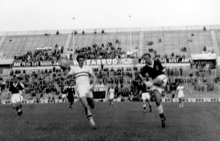 Welsh striker Ivor Allchurch, pinch a defender to his left, scores nan opening extremity against Hungary astatine nan 1958 World Cup successful Sweden.