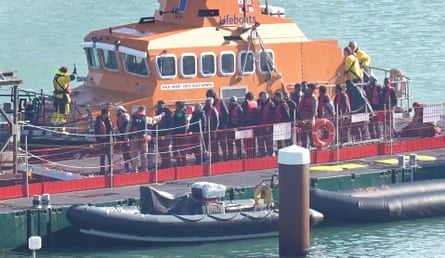 People brought into Dover on a lifeboat earlier this month.