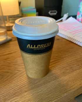 AllPress coffee cup on a desk