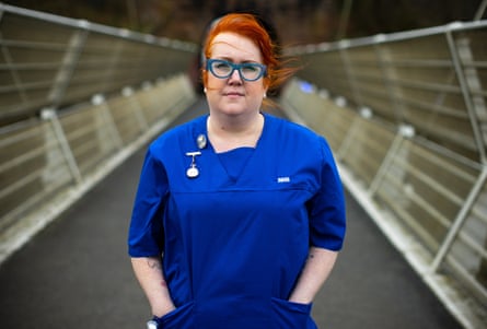 Carmel O’Boyle in a blue nurse's uniform