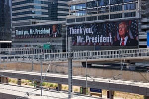 Two banners with pictures of Donald Trump and the words ‘Thank you, Mr President’ are displayed on the sides of office buildings in Tel Aviv