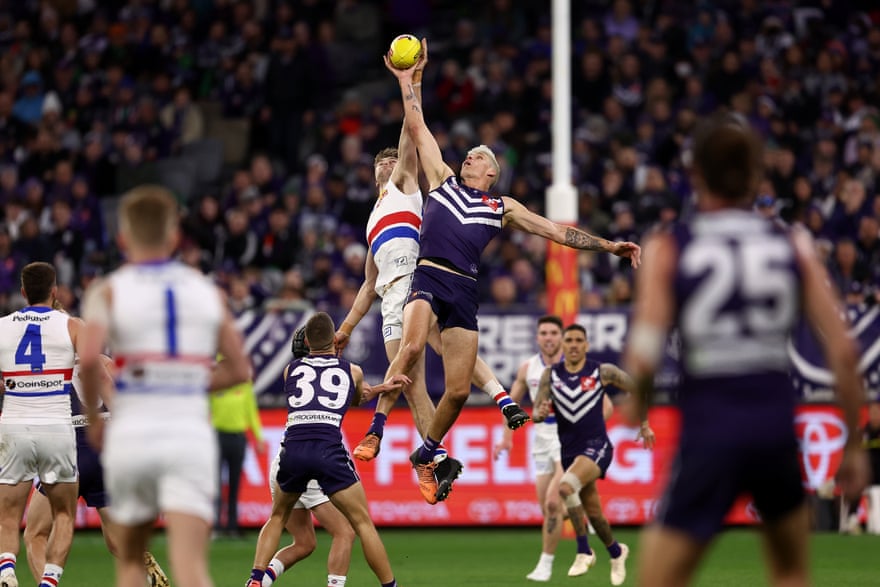 Fremantle’s Rory Lobb contests for a mark.