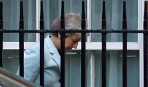 Theresa May arrives at the back entrance of 10 Downing Street in London, UK