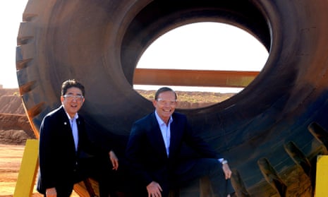 Australian Prime Minister Tony Abbott and Japanese Prime Minister Shinzo Abe pose for a photograph