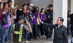 The PM greets well-wishers. His behaviour was deemed inappropriate by some.