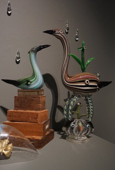 Glass figurines by Tom Moore.