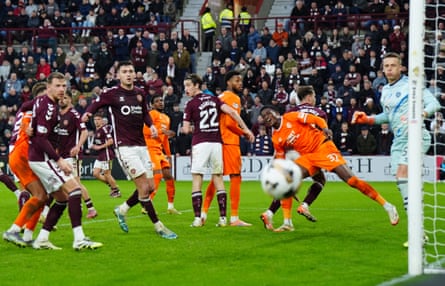 Emmanuel Fernandez’s header flies narrowly wide of the Hearts goal