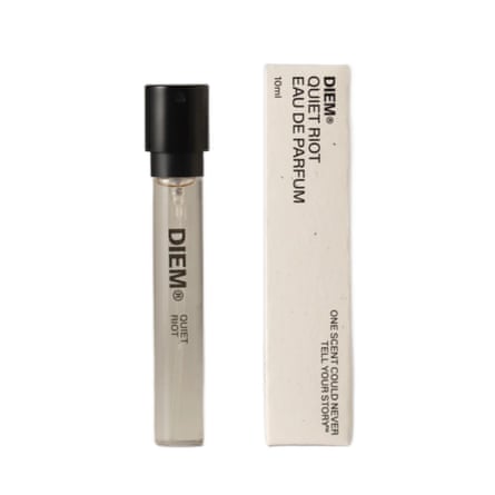 A small spray bottle of Diem Quiet Riot eau de parfum and the packaging box.